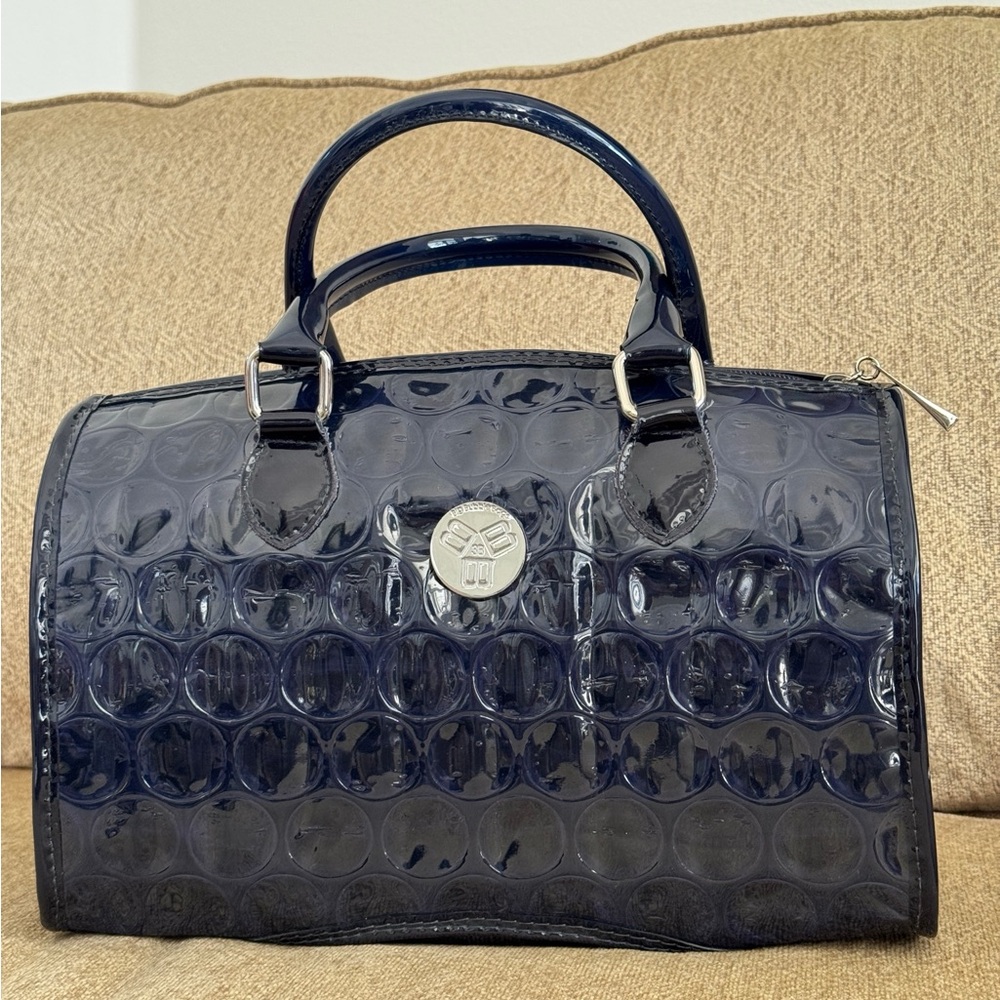 Glossy Navy Blue Handbag with Silver Emblem